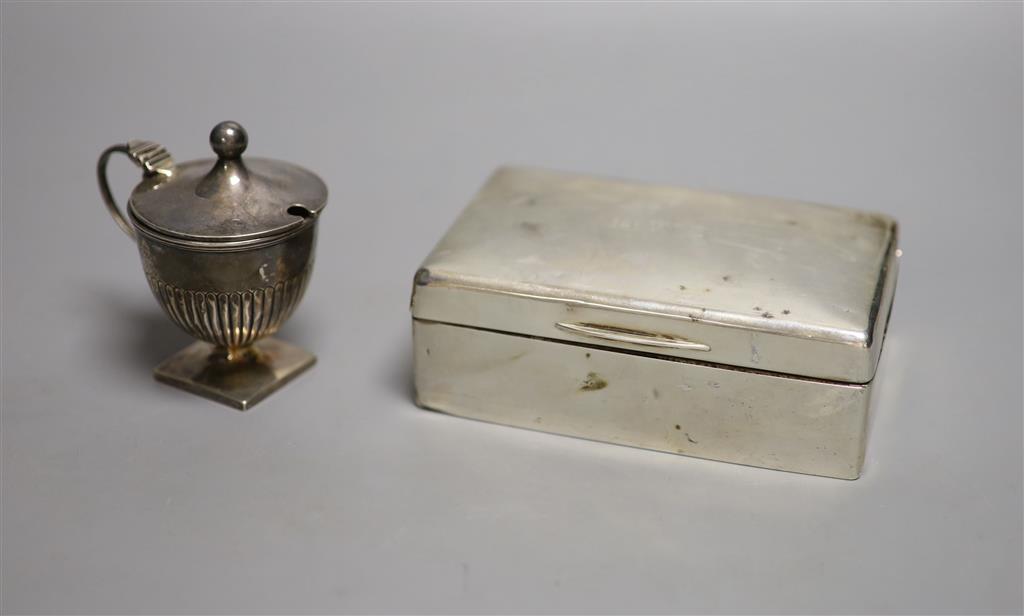 A late Victorian demi fluted silver pedestal mustard pot, Edward Hutton, London, 1893, 85mm & a cigarette box.